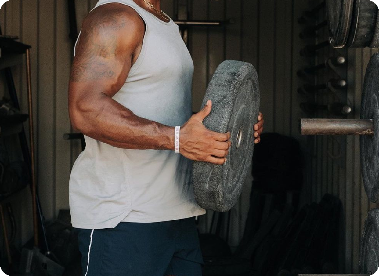Man lifting weight, representing building muscle